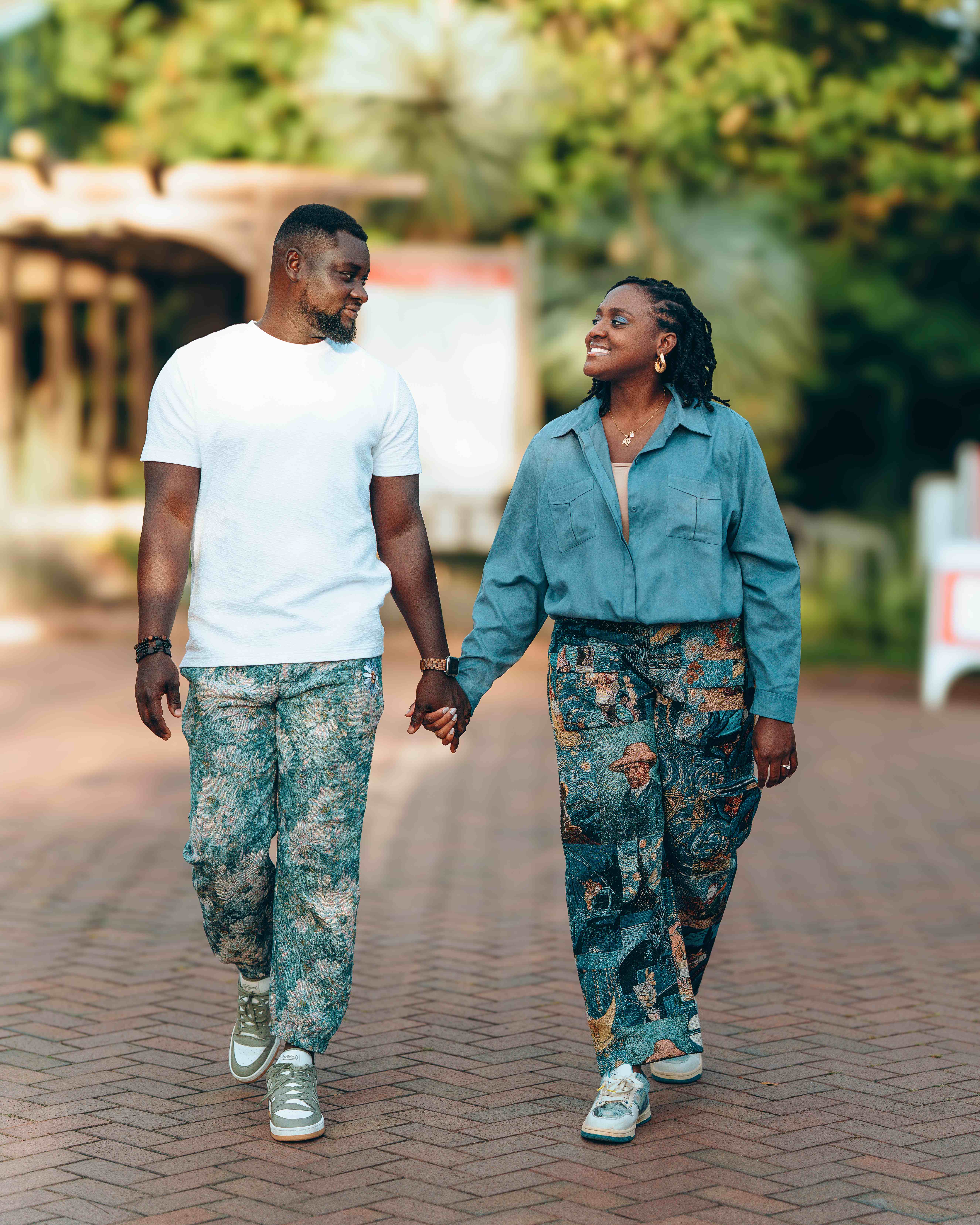 Lovely casual shot walking hand-in-hand